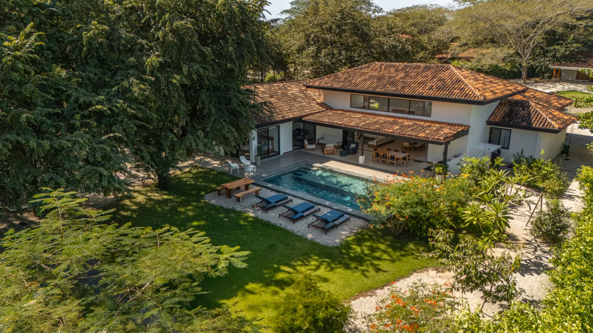 Villa with a pool and terrace set in gardens above the Guanacaste coast