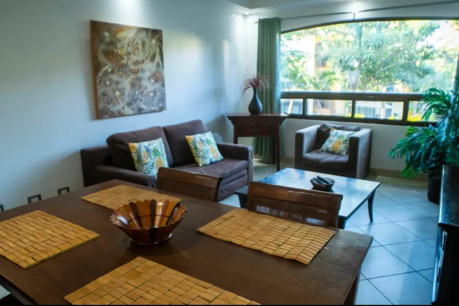 Light-filled living room with garden view at The Oaks 65, Tamarindo